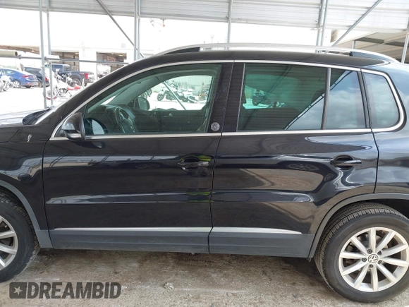 2017 Volkswagen Tiguan Wolfsburg Edition with VIN WVGRV7AX5HW501063, listed as a IAAI auction lot 42099362 with 76,597 mi miles and . Bid and sale history available at DreamBid. Image 14.