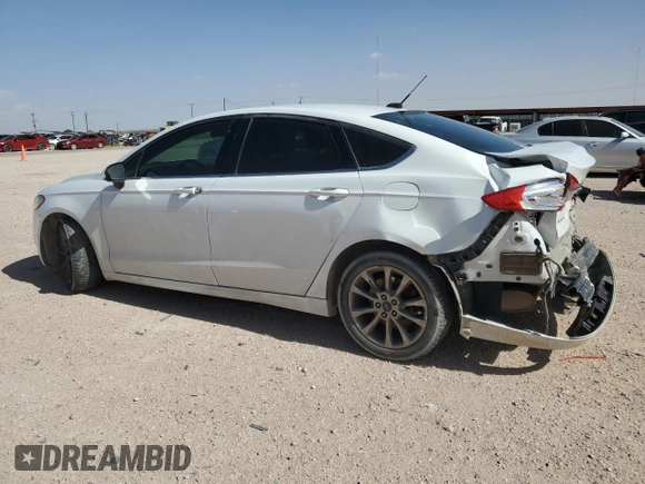 2017 Ford Fusion SE with VIN 3FA6P0H74HR163002, listed as a Copart auction lot 55080005 with 145,006 mi miles and Salvage title. Bid and sale history available at DreamBid. Image 2.