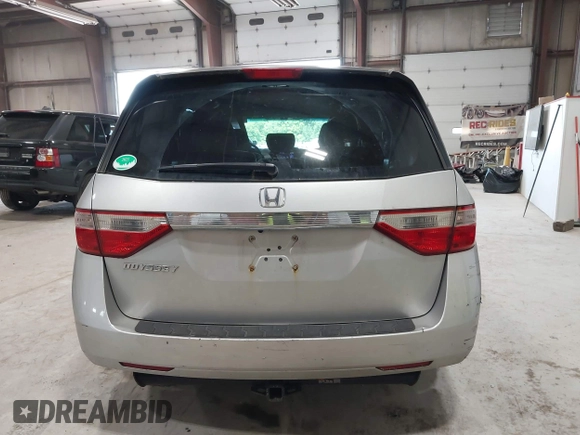 2012 Honda Odyssey EX z VIN 5FNRL5H47CB045705, wystawiony jako IAAI lot #42384430 z przebiegiem 157 598 mil mil oraz . Historia ofert i sprzedaży dostępna na DreamBid. Obrazek 16.