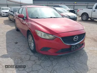 2016 Mazda Mazda6 i Sport with VIN JM1GJ1U56G1409311, listed as a IAAI auction lot 41906256 with 126,548 mi miles. Bid and sale history available at carsss.com. Image 1.