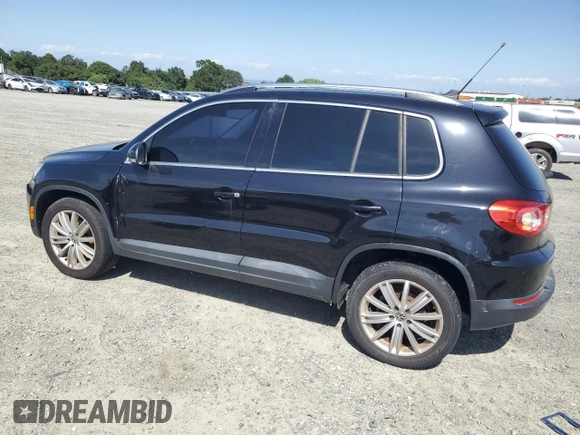 2011 Volkswagen Tiguan SEL w/Premium Navi with VIN WVGAV7AX2BW550158, listed as a Copart auction lot 57649235 with 133,346 mi miles and Clean title. Bid and sale history available at DreamBid. Image 2.