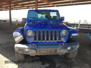 2020 Jeep Wrangler Unlimited Rubicon z VIN 1C4HJXFG1LW234257, wystawiony jako IAAI lot #42269173 z przebiegiem 44 335 mil mil oraz . Historia ofert i sprzedaży dostępna na DreamBid. Obrazek 13.
