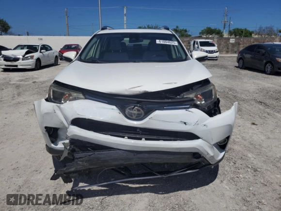 2018 Toyota RAV4 XLE z VIN JTMWFREVXJD127480, wystawiony jako Copart lot #61004625 z przebiegiem 33 179 mil mil oraz Szkoda całkowita • Salvage title. Historia ofert i sprzedaży dostępna na DreamBid. Obrazek 5.