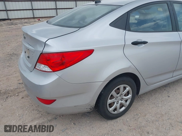 2012 Hyundai Accent GLS z VIN KMHCT4AE8CU095891, wystawiony jako IAAI lot #42256404 z przebiegiem 171 514 mil mil oraz . Historia ofert i sprzedaży dostępna na DreamBid. Obrazek 12.