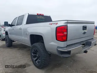 2015 Chevrolet Silverado 1500 LT with VIN 1GCUKREC7FF198486, listed as a IAAI auction lot 42131232 with 151,947 mi miles and . Bid and sale history available at DreamBid. Image 3.