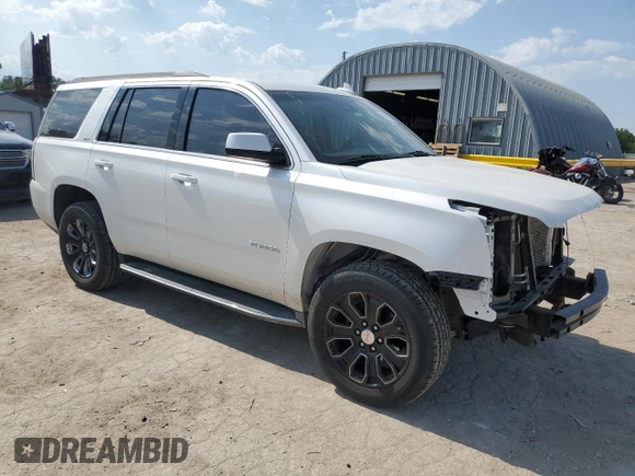 2016 GMC Yukon SLT with VIN 1GKS2BKC2GR253823, listed as a Copart auction lot 62029824 with 98,825 mi miles and Salvage Title. Bid and sale history available at carsss.com. Image 4.