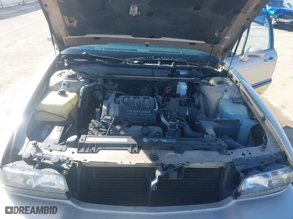 1995 Buick LeSabre Custom with VIN 1G4HP52L1SH567787, listed as a IAAI auction lot 41764984 with 131503 miles. Bid and sale history available at carsss.com. Image 10.