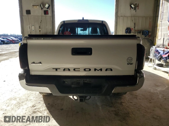 2021 Toyota Tacoma 4WD SR5 with VIN 3TMDZ5BN4MM103311, listed as a Copart auction lot 46486445 with 125,685 mi miles and Salvage Title. Bid and sale history available at carsss.com. Image 6.