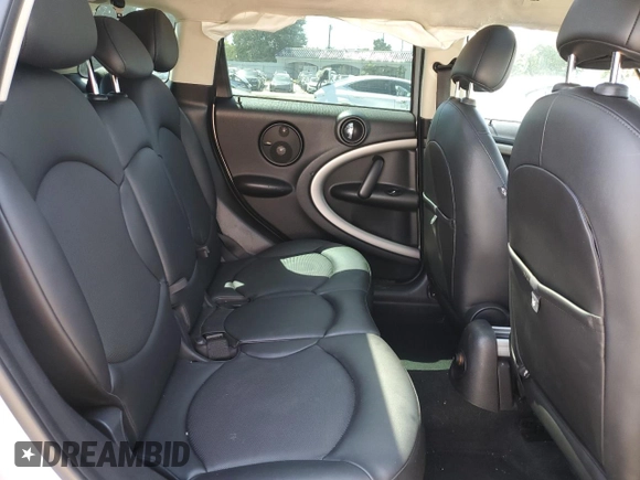 2012 MINI Countryman with VIN WMWZB3C58CWM02843, listed as a Copart auction lot 52131715 with Not Provided miles and Salvage Title. Bid and sale history available at DreamBid. Image 11.