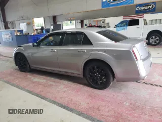 2014 Chrysler 300 with VIN 2C3CCAGG7EH237914, listed as a Copart auction lot 70459044 with 123,916 mi miles and Salvage Title. Bid and sale history available at carsss.com. Image 2.