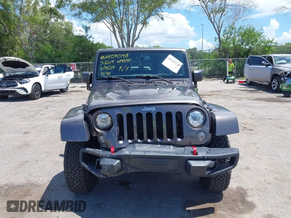 2017 Jeep Wrangler Unlimited Rubicon Recon with VIN 1C4HJWFG2HL560846, listed as a IAAI auction lot 42532745 with 101,285 mi miles and . Bid and sale history available at DreamBid. Image 12.