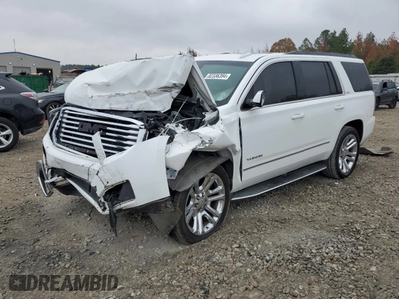 2019 GMC Yukon SLT with VIN 1GKS2BKC2KR338007, listed as a Copart auction lot 82336394 with 105,087 mi miles and Salvage Title. Bid and sale history available at carsss.com. Image 1.