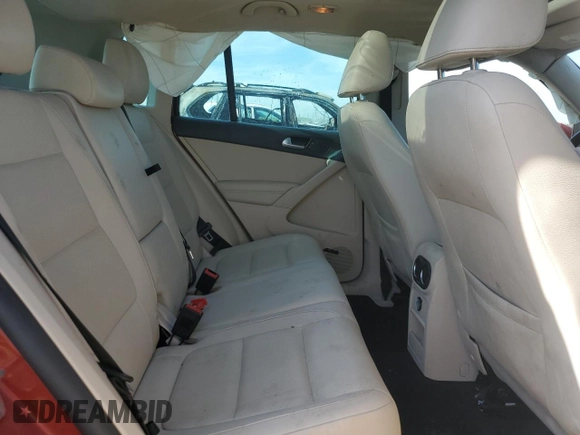 2014 Volkswagen Tiguan SE with VIN WVGAV3AX9EW038118, listed as a Copart auction lot 56329625 with 134,620 mi miles and Salvage title. Bid and sale history available at DreamBid. Image 10.