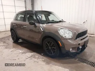2013 MINI Countryman S ALL4 with VIN WMWZC5C51DWP34732, listed as a IAAI auction lot 41381536 with 148,475 mi miles and . Bid and sale history available at DreamBid. Image 1.