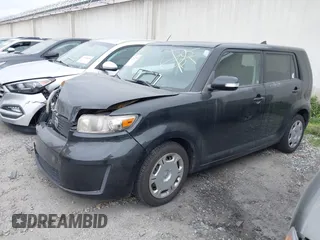 2009 Scion xB with VIN JTLKE50E291093909, listed as a IAAI auction lot 41870259 with 247,549 mi miles. Bid and sale history available at carsss.com. Image 2.