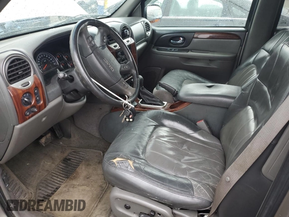 2002 GMC Envoy SLT with VIN 1GKDT13S222296226, listed as a Copart auction lot 51599295 with 148,653 mi miles and Salvage Title. Bid and sale history available at carsss.com. Image 7.