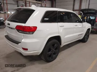 2015 Jeep Grand Cherokee Laredo with VIN 1C4RJFAG4FC747532, listed as a IAAI auction lot 41764541 with 196,385 mi miles. Bid and sale history available at carsss.com. Image 4.