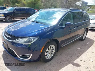 2017 Chrysler Pacifica Touring L with VIN 2C4RC1BG7HR514864, listed as a IAAI auction lot 42187845 with 86,774 mi miles and . Bid and sale history available at DreamBid. Image 22.