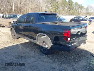 2019 Honda Ridgeline Sport with VIN 5FPYK2F12KB007990, listed as a IAAI auction lot 41828709 with 67,736 mi miles and . Bid and sale history available at DreamBid. Image 3.