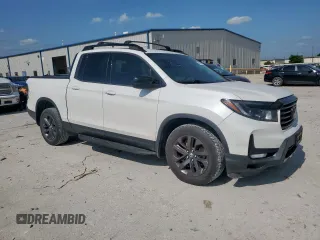 2021 Honda Ridgeline Sport with VIN 5FPYK3F13MB002628, listed as a Copart auction lot 59180075 with 79,454 mi miles and Salvage title. Bid and sale history available at DreamBid. Image 4.