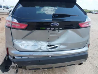 2022 Ford Edge Titanium with VIN 2FMPK4K99NBB06136, listed as a IAAI auction lot 42733977 with 57,794 mi miles and . Bid and sale history available at DreamBid. Image 6.