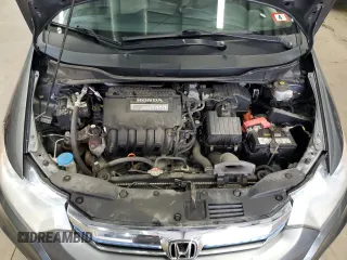 2013 Honda Insight z VIN JHMZE2H36DS002170, wystawiony jako Copart lot #56276445 z przebiegiem 197 871 mil mil oraz Czysty tytuł • Clean title. Historia ofert i sprzedaży dostępna na DreamBid. Obrazek 11.