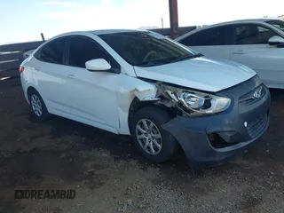 2014 Hyundai Accent GLS with VIN KMHCT4AE0EU656345, listed as a IAAI auction lot 42663039 with 189,665 mi miles and . Bid and sale history available at DreamBid. Image 1.