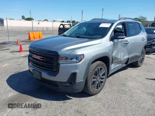 2023 GMC Acadia SLT with VIN 1GKKNML40PZ119581, listed as a IAAI auction lot 41841288 with 23,611 mi miles and . Bid and sale history available at DreamBid. Image 2.