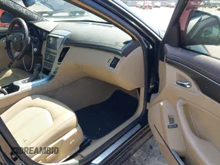 2009 Cadillac CTS RWD w/1SA with VIN 1G6DF577390128796, listed as a IAAI auction lot 42078153 with 257,757 mi miles. Bid and sale history available at carsss.com. Image 5.