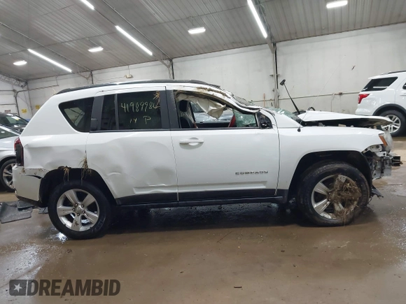 2014 Jeep Compass Sport with VIN 1C4NJDBB3ED773960, listed as a IAAI auction lot 41989986 with 126,875 mi miles. Bid and sale history available at carsss.com. Image 13.