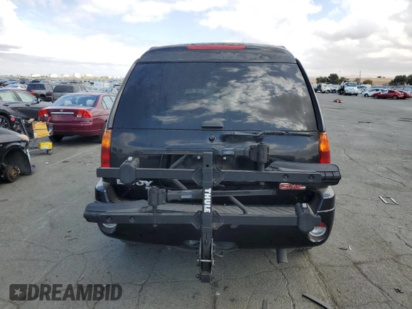 2003 GMC Envoy SLT with VIN 1GKES16SX36220489, listed as a Copart auction lot 71859834 with 148,811 mi miles and Salvage Title. Bid and sale history available at DreamBid. Image 6.