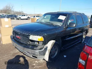 2001 GMC Yukon SLT with VIN 1GKEK13T41R164915, listed as a IAAI auction lot 41841669 with 291,154 mi miles. Bid and sale history available at carsss.com. Image 2.