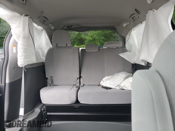 2020 Toyota Sienna LE Auto Access Seat с VIN 5TDKZ3DC8LS068472, выставлен на аукционе Copart как лот 58287195 с пробегом Не указан миль и Списание • Salvage title. История ставок и продаж доступна на DreamBid. Изображение 10.