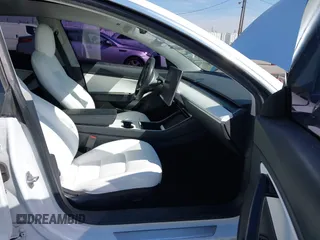 2020 Tesla Model 3 Standard Range Plus with VIN 5YJ3E1EA4LF805205, listed as a IAAI auction lot 41850744 with Not Provided miles. Bid and sale history available at carsss.com. Image 5.