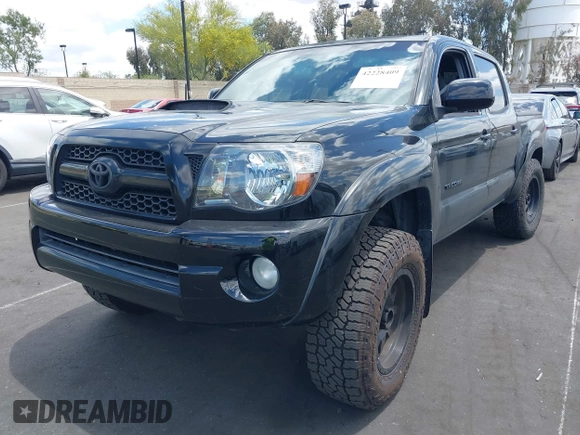 2011 Toyota Tacoma with VIN 3TMLU4EN5BM075967, listed as a IAAI auction lot 42228409 with 158,241 mi miles and . Bid and sale history available at DreamBid. Image 2.