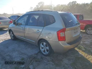 2007 Kia Rondo LX with VIN KNAFG526977114033, listed as a IAAI auction lot 40967531 with 126,761 mi miles. Bid and sale history available at carsss.com. Image 3.