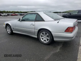 2001 Mercedes-Benz SL 500 z VIN WDBFA68F31F195902, wystawiony jako Copart lot #58252595 z przebiegiem 156 732 mil mil oraz Czysty tytuł • Clean title. Historia ofert i sprzedaży dostępna na DreamBid. Obrazek 2.