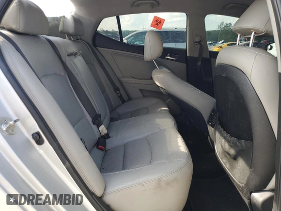 2012 Kia Optima EX z VIN 5XXGN4A75CG083916, wystawiony jako Copart lot #54954205 z przebiegiem 253 854 mil mil oraz Szkoda całkowita • Salvage title. Historia ofert i sprzedaży dostępna na DreamBid. Obrazek 10.