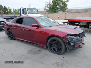 2019 Dodge Charger R/T with VIN 2C3CDXCT2KH749207, listed as a IAAI auction lot 42120658 with 52,330 mi miles and . Bid and sale history available at carsss.com. Image 1.
