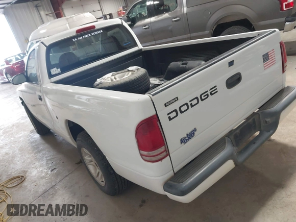 2001 Dodge Dakota with VIN 1B7FL26XX1S304511, listed as a IAAI auction lot 41246101 with 117,457 mi miles. Bid and sale history available at carsss.com. Image 3.
