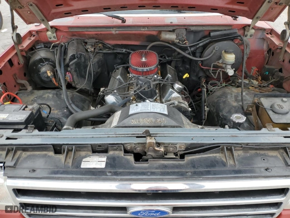 1988 Ford 1/2 Ton Trucks with VIN 1FTDF15Y5JLA36545, listed as a Copart auction lot 82768994 with 518,107 mi miles and Salvage Title. Bid and sale history available at carsss.com. Image 12.