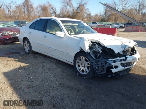 2005 Mercedes-Benz E-Class 3.2L CDI with VIN WDBUF26J75A615933, listed as a IAAI auction lot 41839378 with 124,135 mi miles. Bid and sale history available at carsss.com. Image 1.