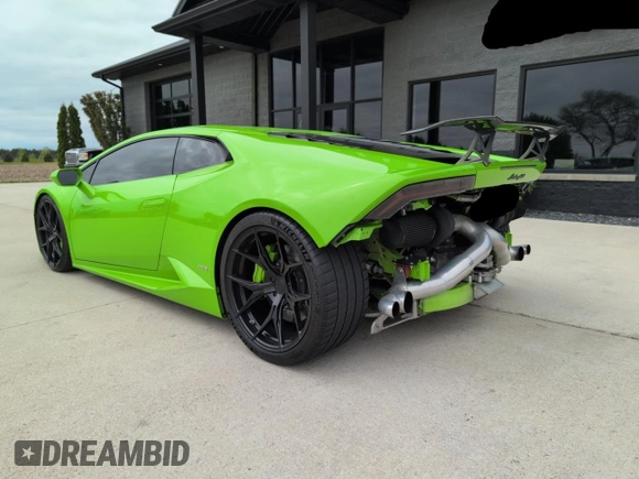 2015 Lamborghini Huracan z VIN ZHWUC1ZF7FLA03405, wystawiony jako Copart lot #57724465 z przebiegiem 31 953 mil mil oraz Czysty tytuł • Clean title. Historia ofert i sprzedaży dostępna na DreamBid. Obrazek 3.