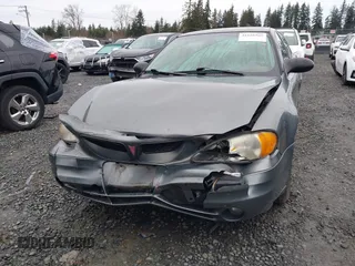 2004 Pontiac Grand Am SE with VIN 1G2NE52F94M530881, listed as a IAAI auction lot 41648302 with 116,540 mi miles. Bid and sale history available at carsss.com. Image 6.