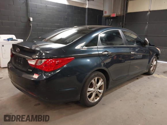 2012 Hyundai Sonata Limited z VIN 5NPEC4AC2CH459115, wystawiony jako IAAI lot #41984793 z przebiegiem 320 814 mil mil oraz . Historia ofert i sprzedaży dostępna na DreamBid. Obrazek 4.