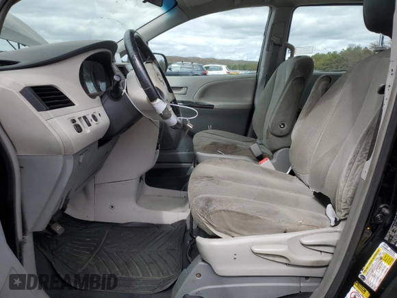 2014 Toyota Sienna L with VIN 5TDZK3DC2ES480859, listed as a Copart auction lot 72732274 with 174,276 mi miles and Non Repairable. Bid and sale history available at carsss.com. Image 7.