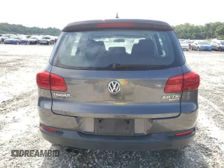2014 Volkswagen Tiguan S z VIN WVGBV3AX2EW519798, wystawiony jako Copart lot #60316895 z przebiegiem 182 002 mil mil oraz Czysty tytuł • Clean title. Historia ofert i sprzedaży dostępna na DreamBid. Obrazek 6.