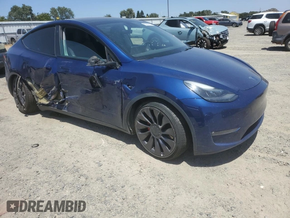 2022 Tesla Model Y Performance z VIN 7SAYGDEF6NF337710, wystawiony jako Copart lot #60200985 z przebiegiem 101 168 mil mil oraz Szkoda całkowita • Salvage title. Historia ofert i sprzedaży dostępna na DreamBid. Obrazek 4.