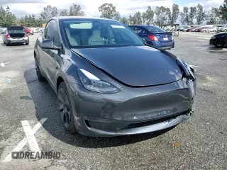 2024 Tesla Model Y z VIN 7SAYGDED1RF089192, wystawiony jako Copart lot #48752085 z przebiegiem 7 643 mil mil oraz Szkoda całkowita • Salvage title. Historia ofert i sprzedaży dostępna na DreamBid. Obrazek 10.