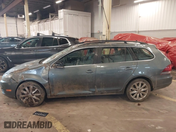 2014 Volkswagen Jetta SportWagen TDI w/Sunroof & Nav with VIN 3VWPL7AJ2EM627998, listed as a IAAI auction lot 41614718 with 134,203 mi miles. Bid and sale history available at carsss.com. Image 14.